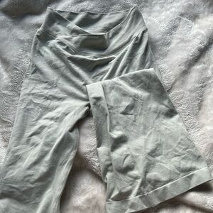 White crossover flare leggings